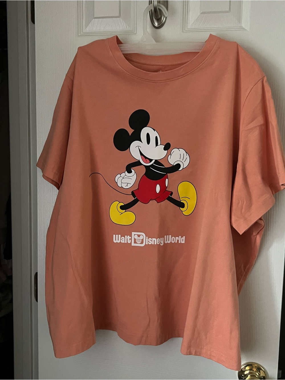 Disney Coral Mickey Mouse Short Sleeve Tee with Black, Red and Yellow Graphic